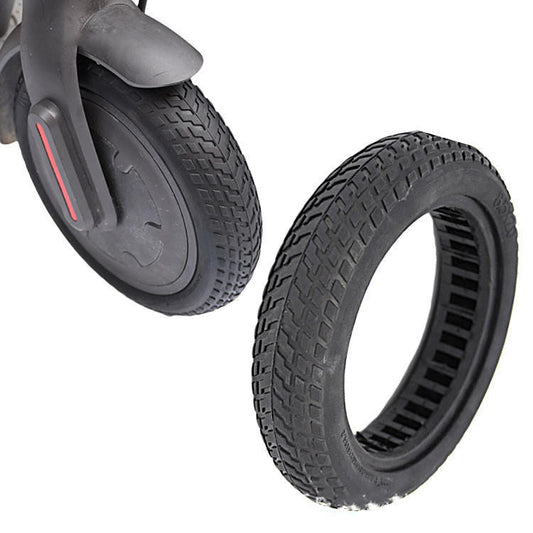 Honeycomb shock-absorbing solid tire