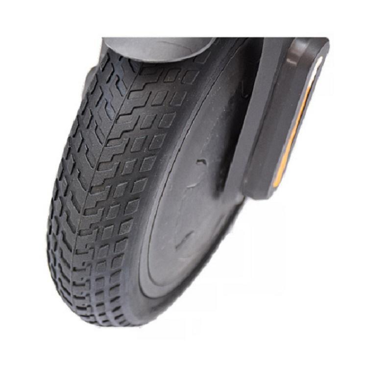 Honeycomb shock-absorbing solid tire