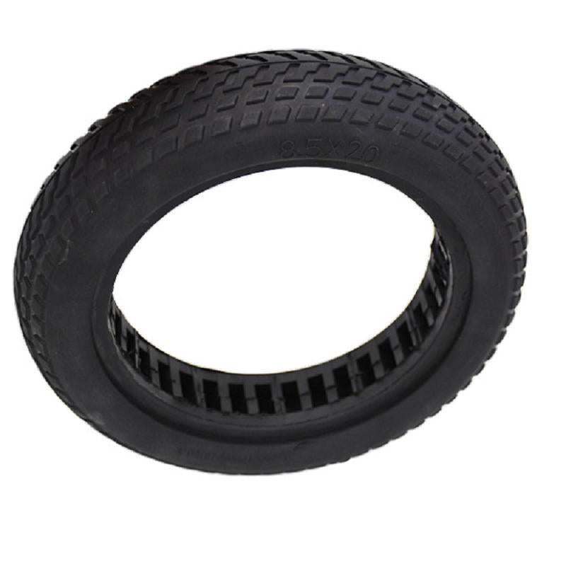 Honeycomb shock-absorbing solid tire